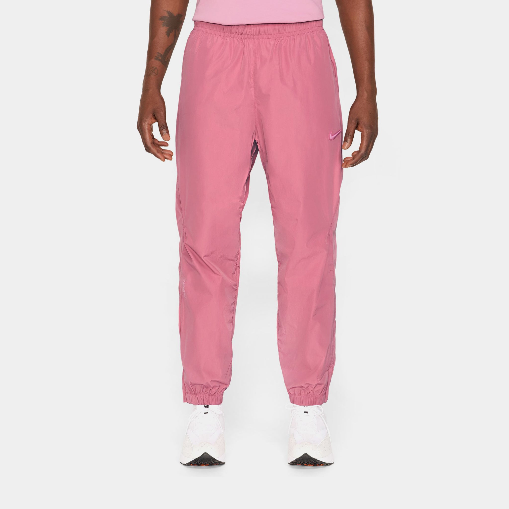 Nike NOCTA Woven Track Mens Pants Pink FN7668-667 – Shoe Palace