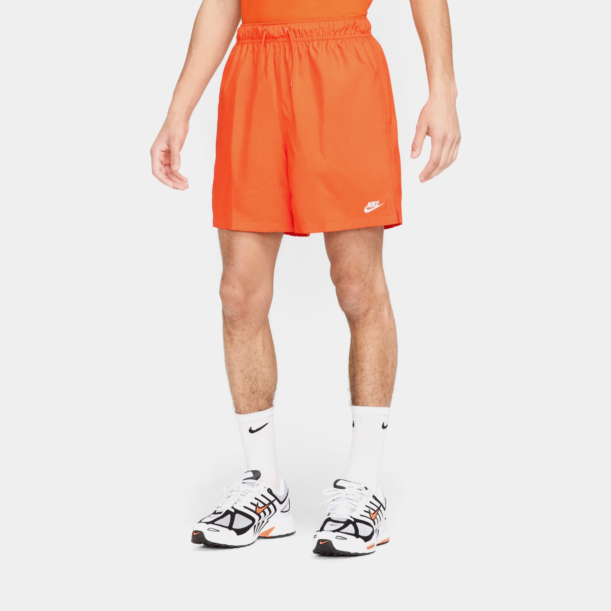 nike swoosh woven shorts orange