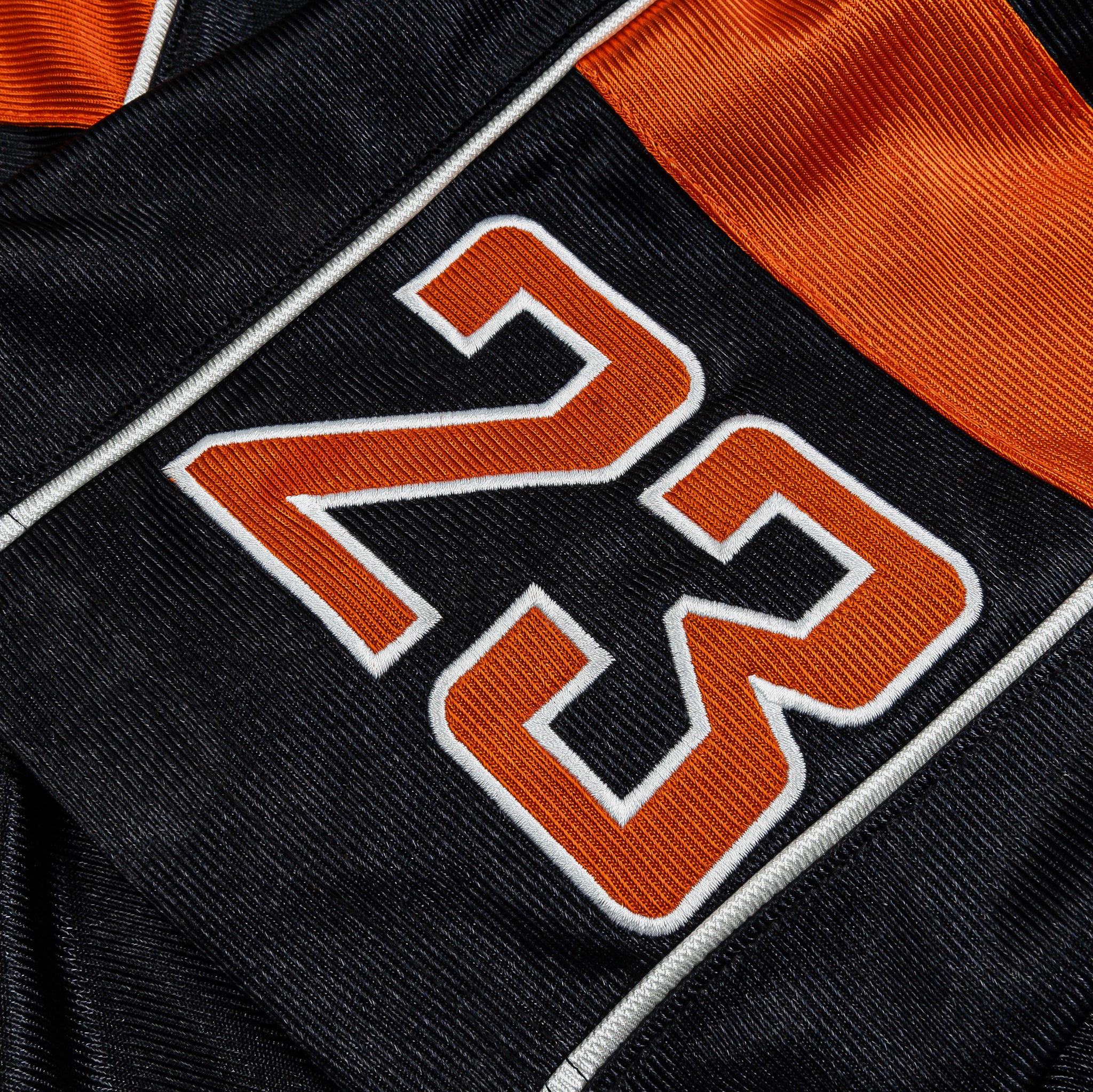 black and orange jordan shorts