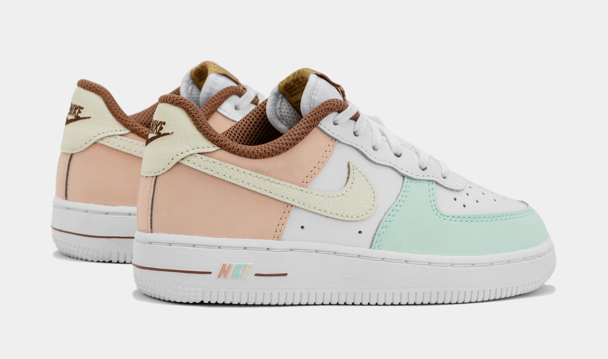 Nike Air Force 1 Shadow trainers in white pink and green