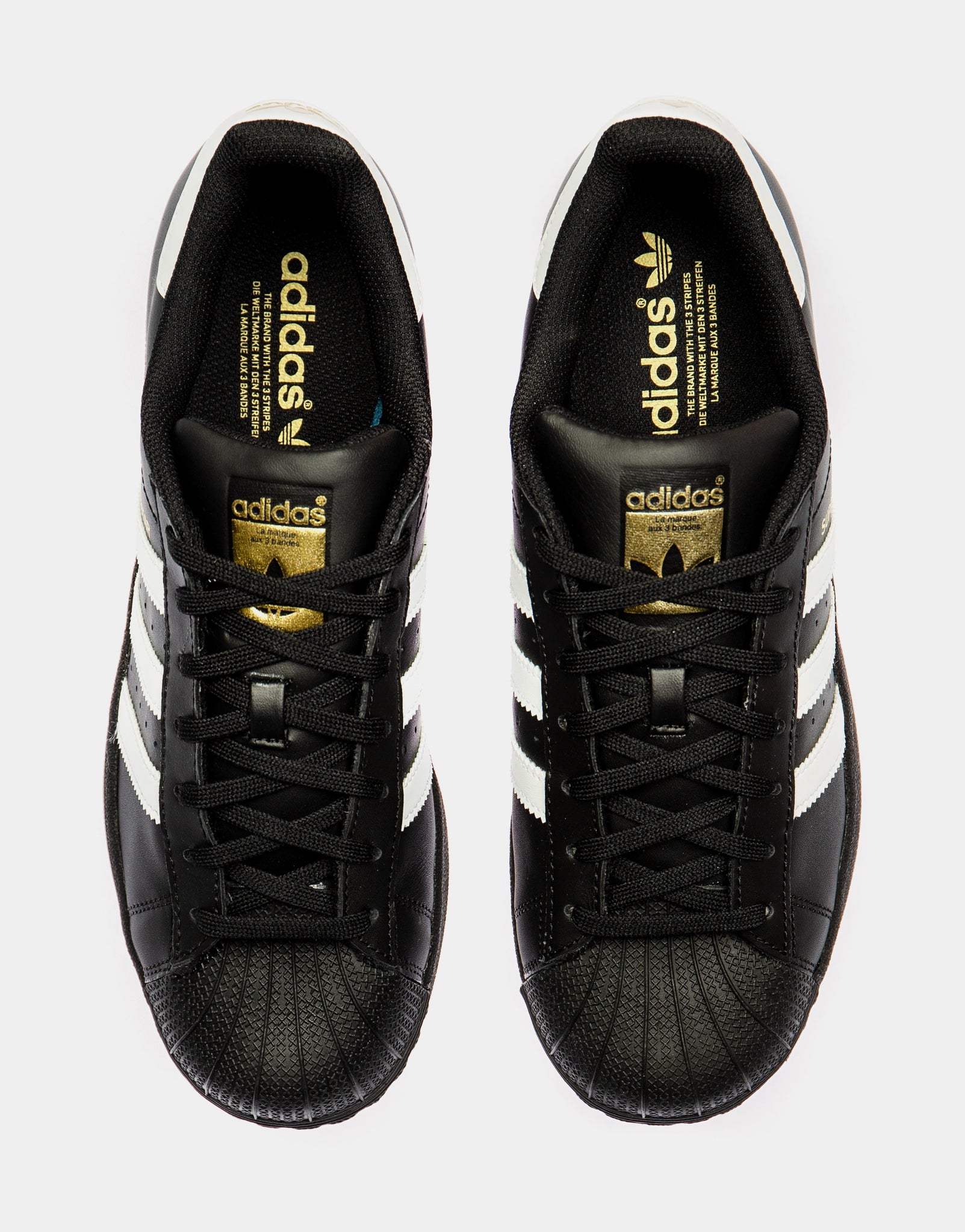 Shell toe black and gold shoes Clearance