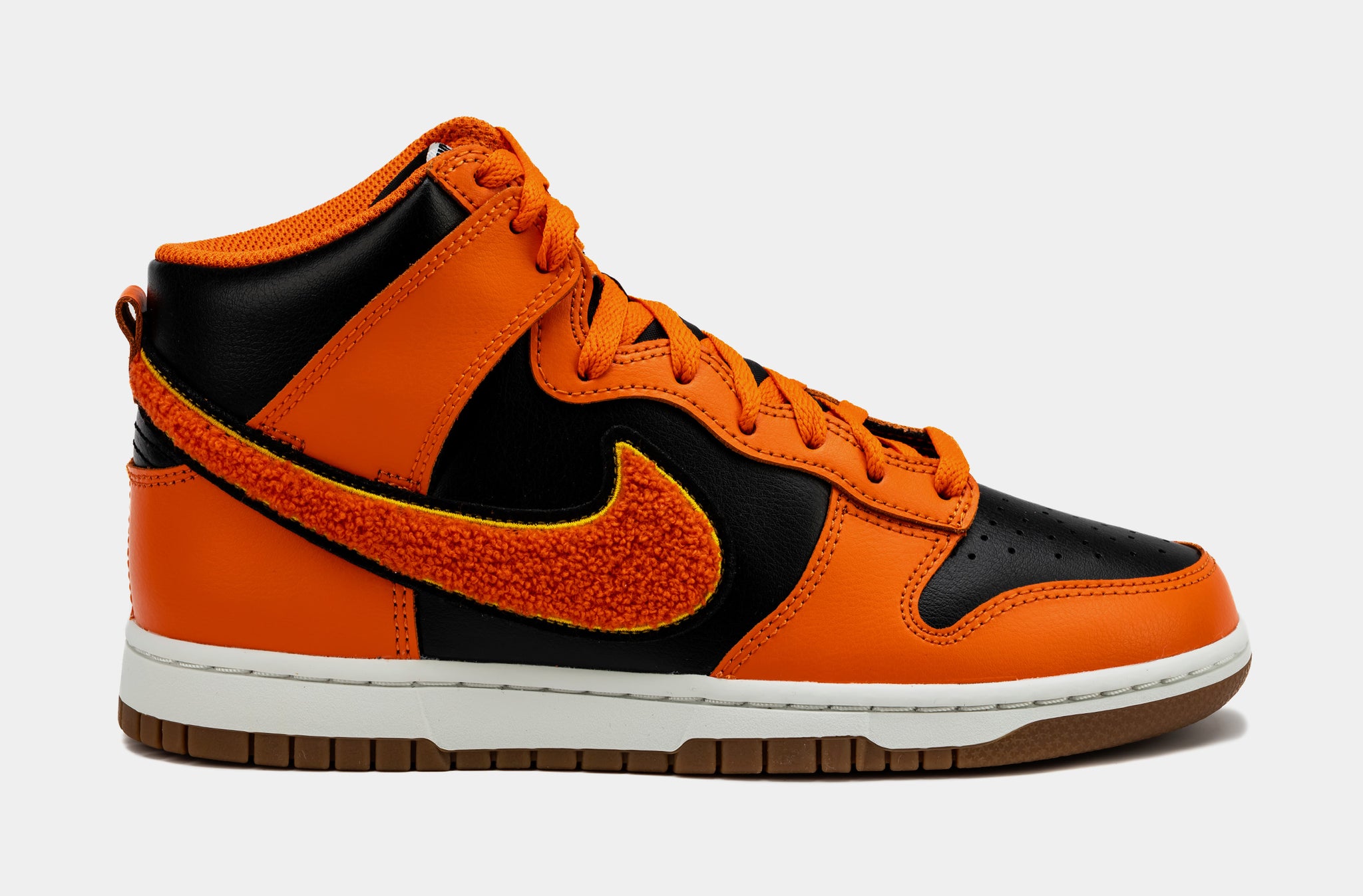 Black 'shoes with orange swoosh Clearance